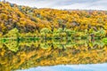 Fisherman Ã¢â¬Ës house on lake in the autumn forest.